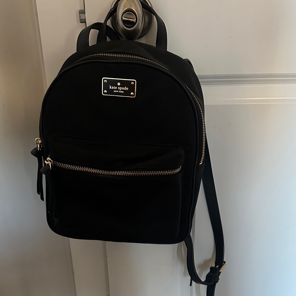 kate spade black backpack with gold hardware